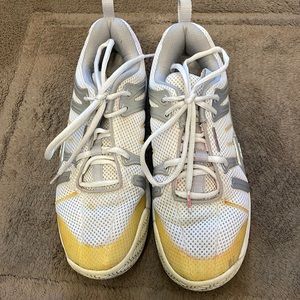 Wilson tennis shoes. Size 9. Used only when playing tennis.